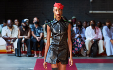 A female model walks the runway at Theophilio's New York Fashion Week show.