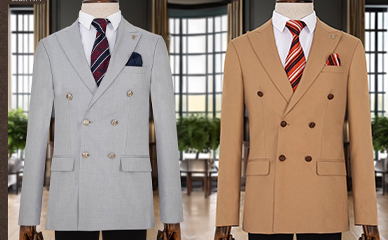 Two men's suit jackets on two mannequins by Zouhuir NYC Group.